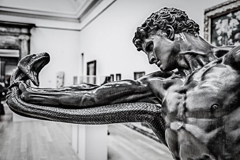 anathletewrestlingwithapython-fredericleighton